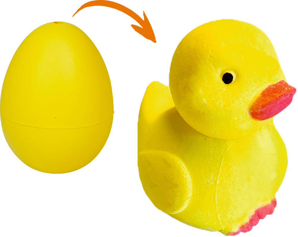 Ein gelbes Ei. Ein Pfeil zeigt auf eine gelbe Gummiente.
