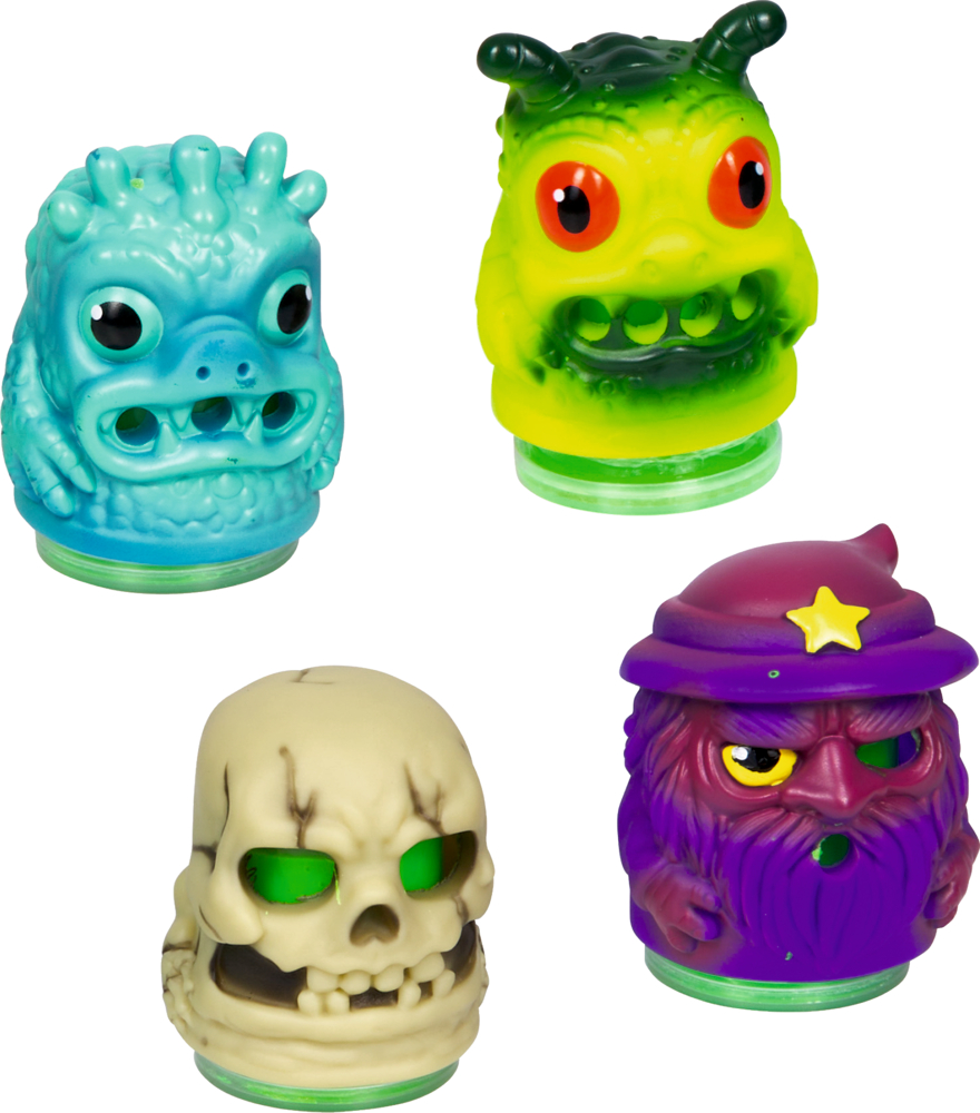 Vier bunte Spielfiguren mit Monster- und Totenkopfdesign, farblich in Blau, Grün, Beige und Lila gehalten.