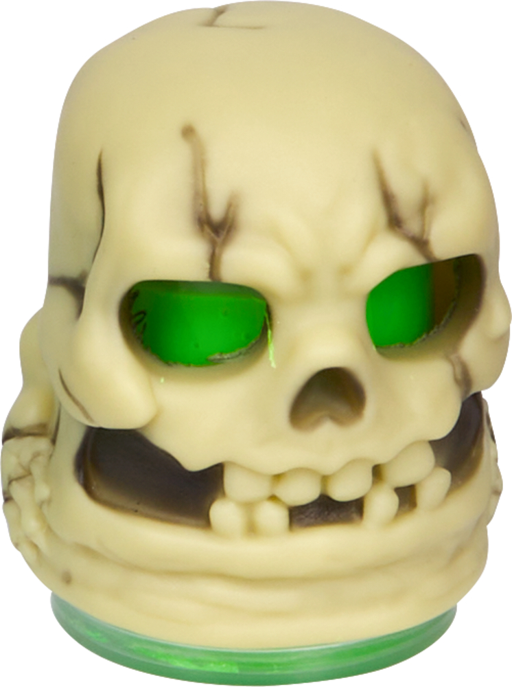 Beigefarbener Totenkopf mit grünen Augenhöhlen und dunklen Rissen, auf grünem runden Sockel.